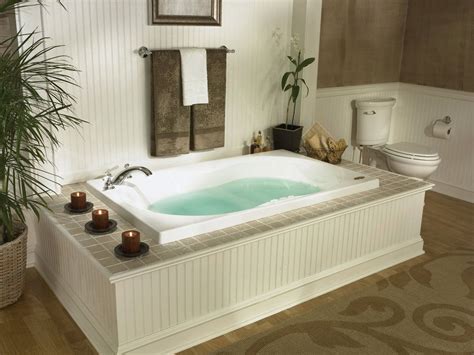 jacuzzi tub with shower surround.